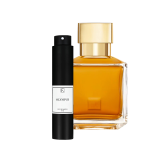 Zwei Parfümflaschen: eine schwarze, zylindrische Sprühflasche mit „Olympus 10ml“-Label, daneben eine goldene Glasflasche.